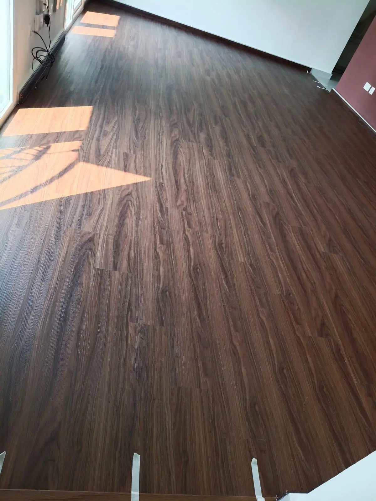 Qatar Breeze Oak SPC flooring in a bright Doha room